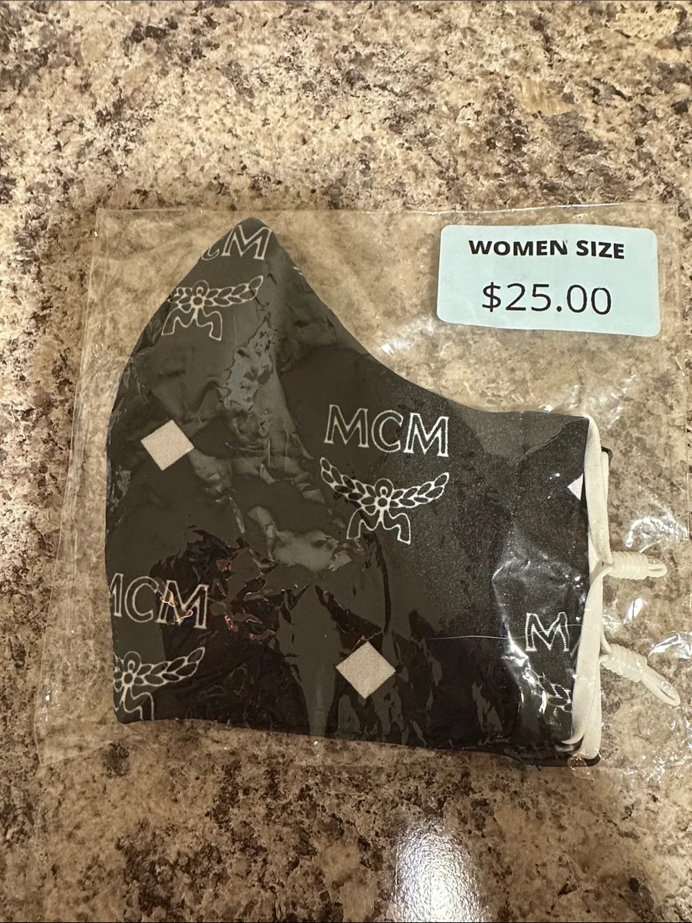 M C M Printed Face Mask